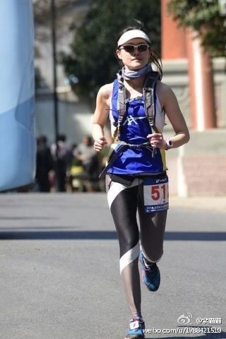 遇见一场玉兰花瓣雨----杭州亚瑟士山地马拉松半程记