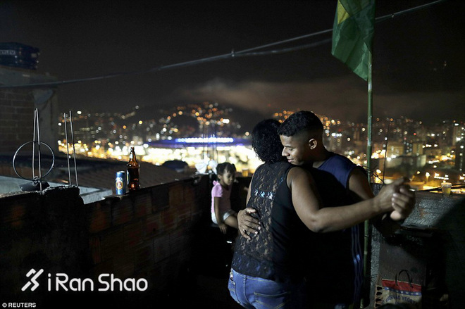 里约奥运 | 走出聚光灯下的阴影  照亮贫民窟里的体育梦