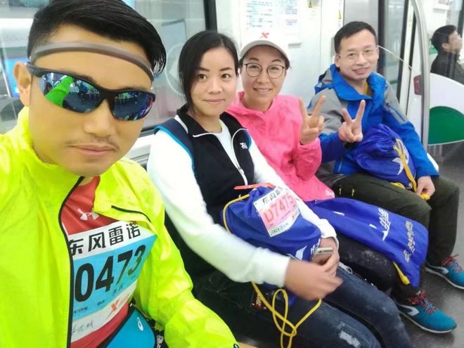 披上黄袍，投入雨战----汉马赛后小记