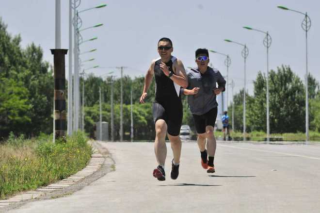 那双即使再残破，也会被我永远保存的跑鞋