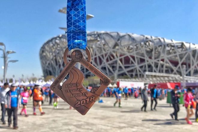 2018 年，在 7 个城市跑 8 场比赛